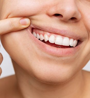 a person showing off their healthy gums