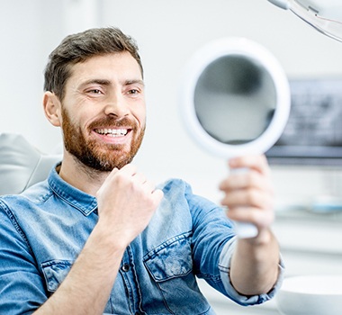 Man smiling with dental bridge in Landrum 