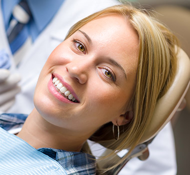 Woman smiling in dental chair