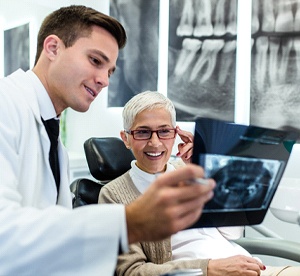 Cosmetic dentist in Landrum showing patient X-ray