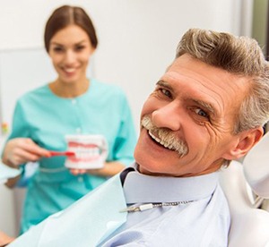 elderly man at a dentist appointment
