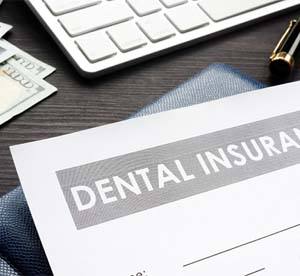 Dental insurance form on desk