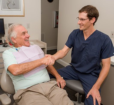 Landrum emergency dentist Dr. Moneyhun meeting with patient