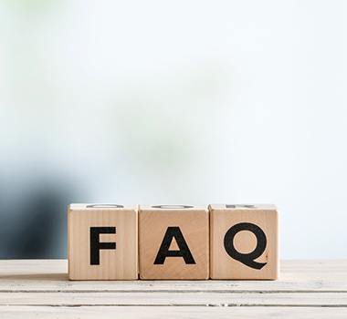 FAQ wooden letter blocks on a ledge