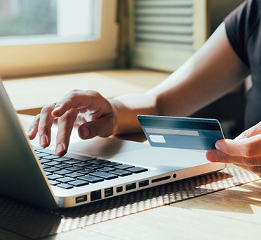 Woman using credit card