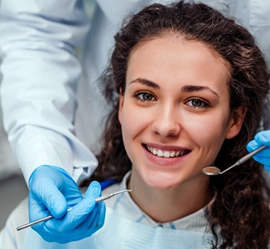 woman smiling in dental chair