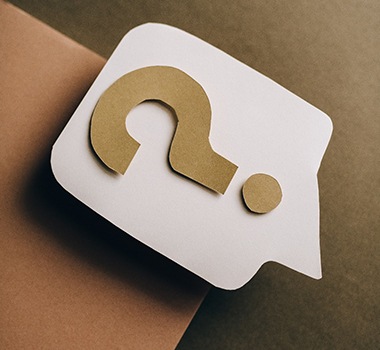 Paper question mark on envelop 