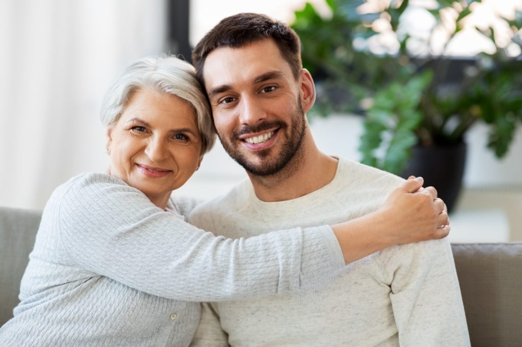 parent hugging adult child