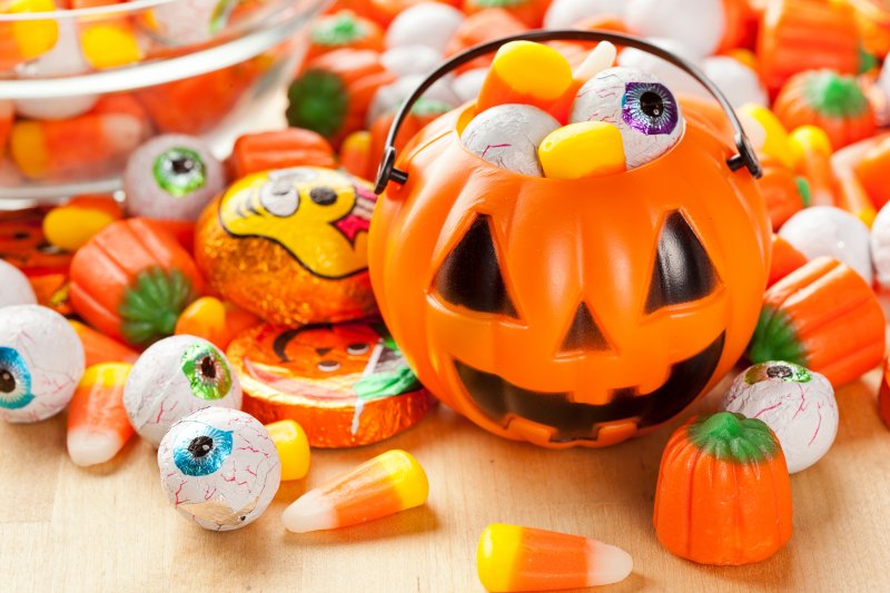 A bucket of Halloween treats that can hurt dental health