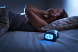 Woman woken up during the night due to her sleep apnea